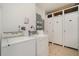 Shared laundry room with coin-operated washer and dryer at 9011 Midnight Pass Rd # 329, Sarasota, FL 34242