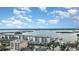 Aerial view showcasing waterfront property and community at 9011 Midnight Pass Rd # 329, Sarasota, FL 34242