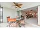 Covered lanai with outdoor seating and view of the living area at 9011 Midnight Pass Rd # 329, Sarasota, FL 34242