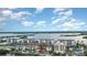 Aerial view of waterfront community with lush landscaping at 9011 Midnight Pass Rd # 329, Sarasota, FL 34242
