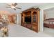 Bright living room with built-in entertainment center and access to main bedroom at 9011 Midnight Pass Rd # 329, Sarasota, FL 34242
