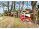 Several kayaks are stored on a rack outside at 9011 Midnight Pass Rd # 329, Sarasota, FL 34242