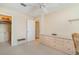 Bedroom with built-in shelving and dresser at 9011 Midnight Pass Rd # 329, Sarasota, FL 34242