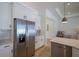Stainless steel appliances and white shaker cabinets in kitchen at 14294 Mcfarland Ave, Port Charlotte, FL 33981