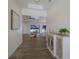 View through entryway showcasing the living room and pool access at 14294 Mcfarland Ave, Port Charlotte, FL 33981