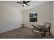 Bright bedroom with wood-look floors and ceiling fan at 14294 Mcfarland Ave, Port Charlotte, FL 33981