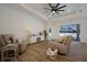 Living area with comfortable seating, hardwood floors, and pool view at 14294 Mcfarland Ave, Port Charlotte, FL 33981