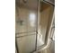 Clean shower with glass enclosure at 707 Riverview Cir, North Port, FL 34287