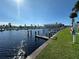 Wooden dock on the waterfront with access to the canal at 707 Riverview Cir, North Port, FL 34287