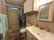 Bathroom with bathtub, toilet and sink at 707 Riverview Cir, North Port, FL 34287
