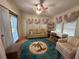 Bright sunroom with ample natural light and comfy seating at 707 Riverview Cir, North Port, FL 34287