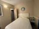 Bedroom with a double bed and nightstand at 707 Riverview Cir, North Port, FL 34287