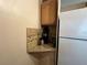 Kitchen corner with granite countertop and coffee station at 707 Riverview Cir, North Port, FL 34287