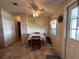 Cozy dining area with a table and chairs, perfect for small meals at 707 Riverview Cir, North Port, FL 34287