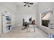 Bright home office features built-in shelving and large window at 3743 Albacete Cir # 84, Punta Gorda, FL 33950