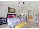 Comfortable bedroom with queen-size bed and access to bathroom at 3743 Albacete Cir # 84, Punta Gorda, FL 33950