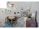 Casual dining area with table and chairs, view to living room at 3743 Albacete Cir # 84, Punta Gorda, FL 33950