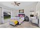 Cozy bedroom with queen bed and built-in vanity at 3743 Albacete Cir # 84, Punta Gorda, FL 33950