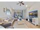 Spacious living room with comfortable seating and large TV at 3743 Albacete Cir # 84, Punta Gorda, FL 33950