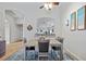 Bright dining area with table and chairs, open to kitchen at 3743 Albacete Cir # 84, Punta Gorda, FL 33950