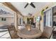 Relaxing covered patio with seating area, adjacent to the pool at 7417 S Blue Sage, Punta Gorda, FL 33955