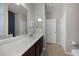Modern bathroom with double sinks, and a large mirror at 20149 Lagente Cir, Venice, FL 34293
