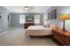 Spacious bedroom with large bed, dresser, and nightstands at 20149 Lagente Cir, Venice, FL 34293