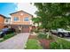 Two-story townhome with a two-car garage and landscaped yard at 20149 Lagente Cir, Venice, FL 34293