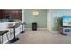 Kitchen with breakfast bar, stainless steel appliances, and granite countertops at 20149 Lagente Cir, Venice, FL 34293