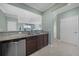 Kitchen with stainless steel appliances and granite countertops at 20149 Lagente Cir, Venice, FL 34293