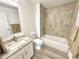 Updated bathroom with tub shower combo and vanity at 3140 Sweet Gum Dr, Punta Gorda, FL 33982