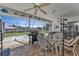 Relaxing screened pool area with patio furniture at 3494 Yukon Dr, Port Charlotte, FL 33948