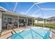 Private pool and spa area with screened enclosure at 3494 Yukon Dr, Port Charlotte, FL 33948
