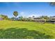 Spacious backyard with lush grass and waterfront views at 3494 Yukon Dr, Port Charlotte, FL 33948
