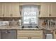 Kitchen with granite countertops, double sink, and stainless steel appliances at 3494 Yukon Dr, Port Charlotte, FL 33948