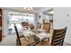 Dining area with glass table and views of the pool and patio at 3494 Yukon Dr, Port Charlotte, FL 33948