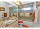 Bathroom boasts granite vanity and a shower/tub combo at 3494 Yukon Dr, Port Charlotte, FL 33948
