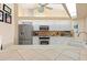 Modern kitchen featuring stainless steel appliances and white cabinets at 4077 La Costa Island Ct, Punta Gorda, FL 33950