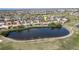 Home sits on a golf course overlooking a lake at 4077 La Costa Island Ct, Punta Gorda, FL 33950