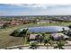 Property view showcasing a golf course and lake community at 4077 La Costa Island Ct, Punta Gorda, FL 33950
