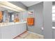 Bright bathroom with double vanity and gray walls at 4077 La Costa Island Ct, Punta Gorda, FL 33950