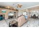Bright living room with a large TV and comfortable seating at 4077 La Costa Island Ct, Punta Gorda, FL 33950