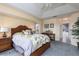Comfortable bedroom with a wooden bed frame and soft carpet at 4077 La Costa Island Ct, Punta Gorda, FL 33950