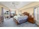 Relaxing main bedroom with water views and tray ceiling at 4077 La Costa Island Ct, Punta Gorda, FL 33950