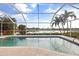 Relaxing pool and patio area with golf course view at 4077 La Costa Island Ct, Punta Gorda, FL 33950