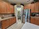 Well-organized pantry with adjustable shelving maximizing storage space at 5291 Laurel Oak Ct, North Port, FL 34287