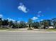 Inviting community entrance with lush landscaping and signage at 5291 Laurel Oak Ct, North Port, FL 34287