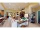 Bright and airy living room with comfortable seating and large windows at 5291 Laurel Oak Ct, North Port, FL 34287