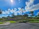 Gated community entrance with landscaping and signage at 5291 Laurel Oak Ct, North Port, FL 34287