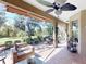 Relaxing screened patio with view of backyard at 5291 Laurel Oak Ct, North Port, FL 34287